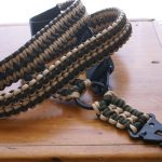 Convertible single point paracord rifle sling. Primary color tan. Secondary color od green. Double cobra weave. HK hooks.