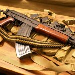 Two point paracord rifle sling. Primary color coyote brown. Secondary color black. Double cobra weave.