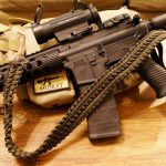 Tavor convertible single point paracord gun sling. Primary color od green. Secondary color black. Double cobra weave. Push button quick release swivels.