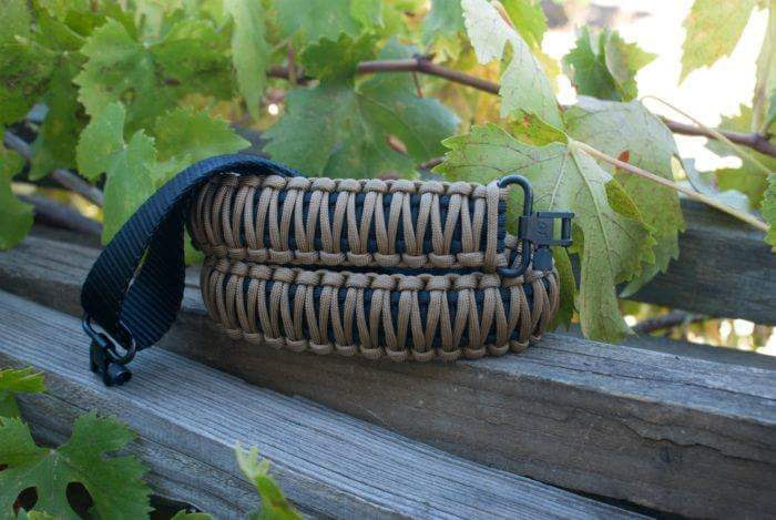 Two point paracord gun sling. Primary color coyote brown. Secondary color black. King cobra weave. GrovTec quick disconnect swivels.