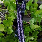Two point paracord gun sling. Primary color purple camo. Secondary color black. Extra wide double cobra. GrovTec quick disconnect swivels.