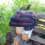 Tavor convertible single point paracord gun sling. Primary color black. Secondary color red. King cobra weave. Push button quick release swivels.