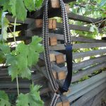 Single point paracord rifle sling. Primary color Tan. Secondary color od green. Double cobra weave. Push button quick release swivel.