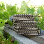 Two point paracord gun sling. Primary color brown. Secondary color coyote brown. Double cobra weave. TOC quick disconnect swivels.