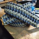 Two point paracord gun sling. Primary color desert camo. Secondary color grey. Extra wide double cobra weave. GrovTec quick disconnect swivels.