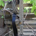 Convertible single point paracord rifle sling. Primary color woodland camo. Secondary color coyote brown. Extra wide double cobra weave. Push button quick release swivel and hk hook.