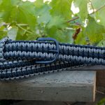 Fixed length paracord belt. Primary color ACU camo. Secondary color black. Double cobra weave. Black belt buckle.