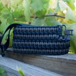 Two point paracord gun sling. Primary color grey. Secondary color black. Double cobra weave. GrovTec quick disconnect swivels.