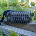 Two point paracord gun sling. Primary color grey. Secondary color black. King cobra weave. GrovTec quick disconnect swivels.
