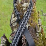 Two point paracord gun sling. Primary color grey. Secondary color black. Double cobra weave. GrovTec quick disconnect swivels.