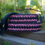 Two point paracord gun sling. Primary color pink camo. Secondary color black. Double cobra weave. GrovTec quick disconnect swivels.