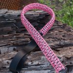 Two point paracord gun sling. Primary color pink camo. Secondary color black. King cobra weave. TOC quick disconnect swivels.